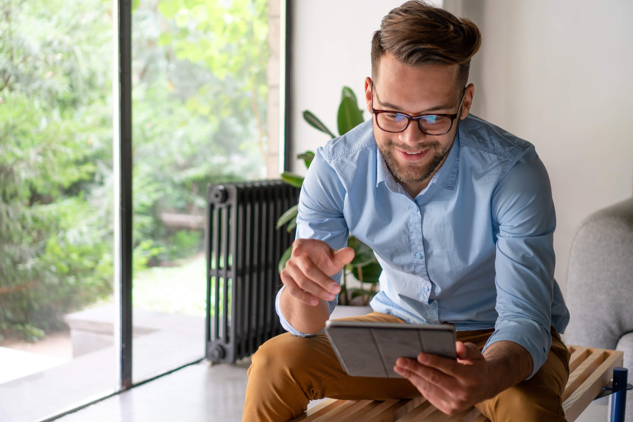 Professional man holding tablet